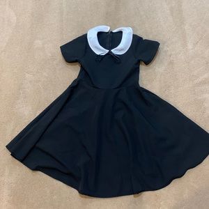 Wednesday Addams retro style dress for Halloween. Just add braids and a scowl!